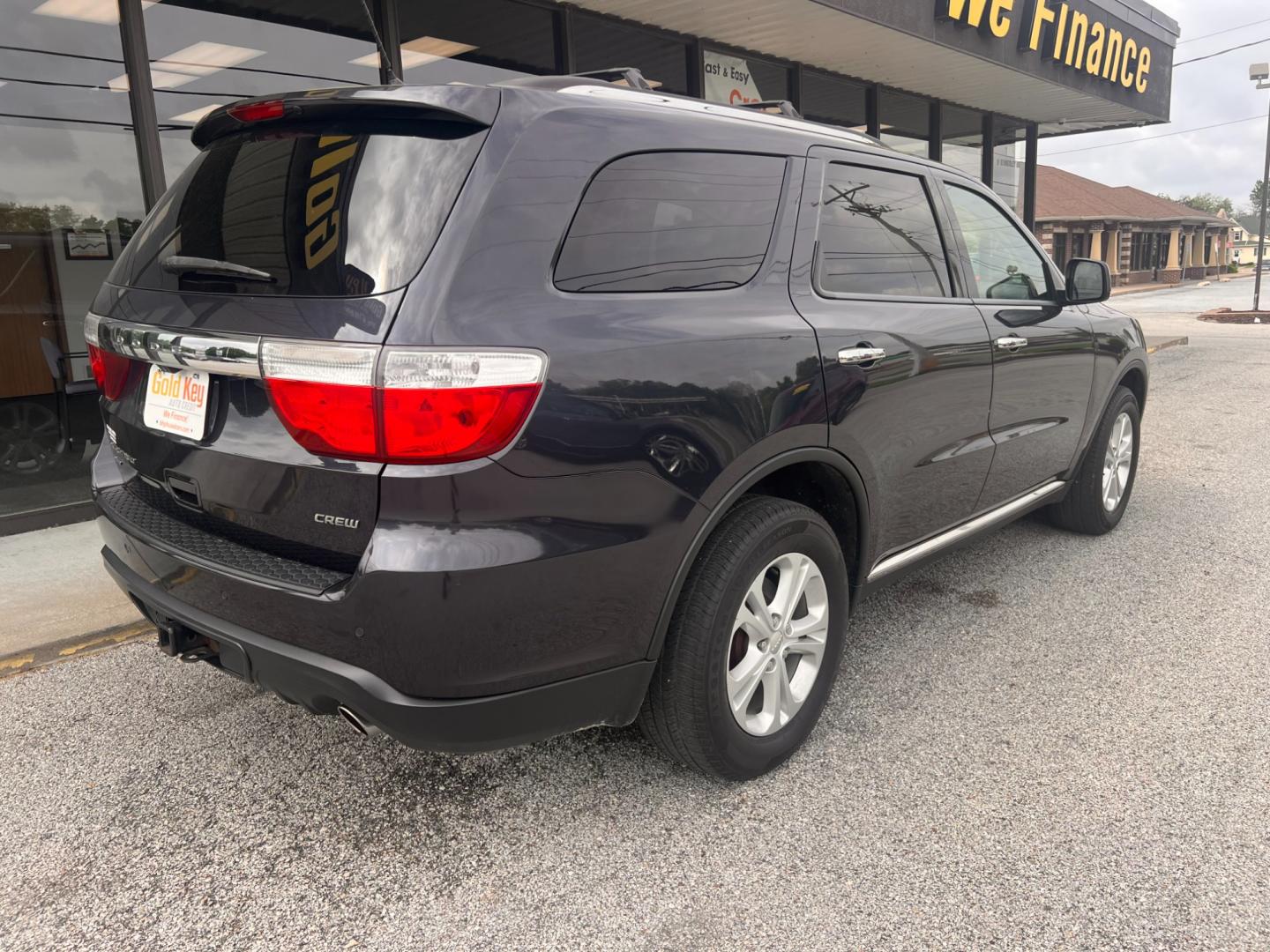 2013 Brilliant Black Crystal Pearl Dodge Durango Crew AWD (1C4RDJDG8DC) with an 3.6L V6 DOHC 24V engine, 5-Speed Automatic transmission, located at 1633 W Kimberly, Davenport, IA, 52806, (563) 323-5341, 41.559456, -90.598732 - Photo#3